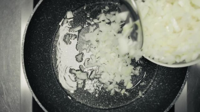 cook preparing hot sauce with Tabasco