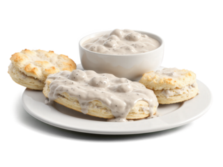 Biscuits and gravy, flaky buttermilk biscuits smothered in peppery white sausage gravy, bright but rustic, hero shot transparent