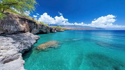 Obraz premium Breathtaking cliffside view of clear turquoise ocean and blue sky