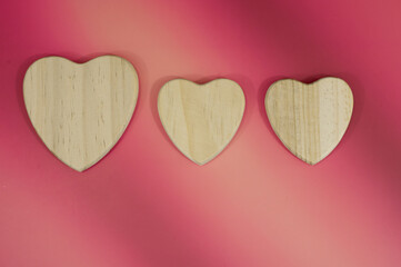 Red hearts and candles on red background with lighting love you letters word text 