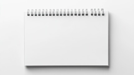 Blank spiral notepad isolated on white background.  Top view.