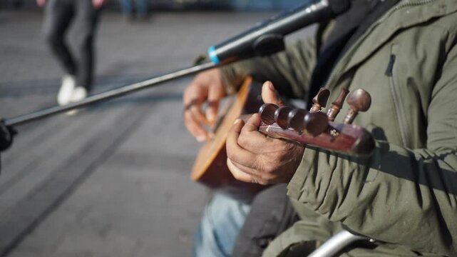  men playing traditional music instrument turkish saz 