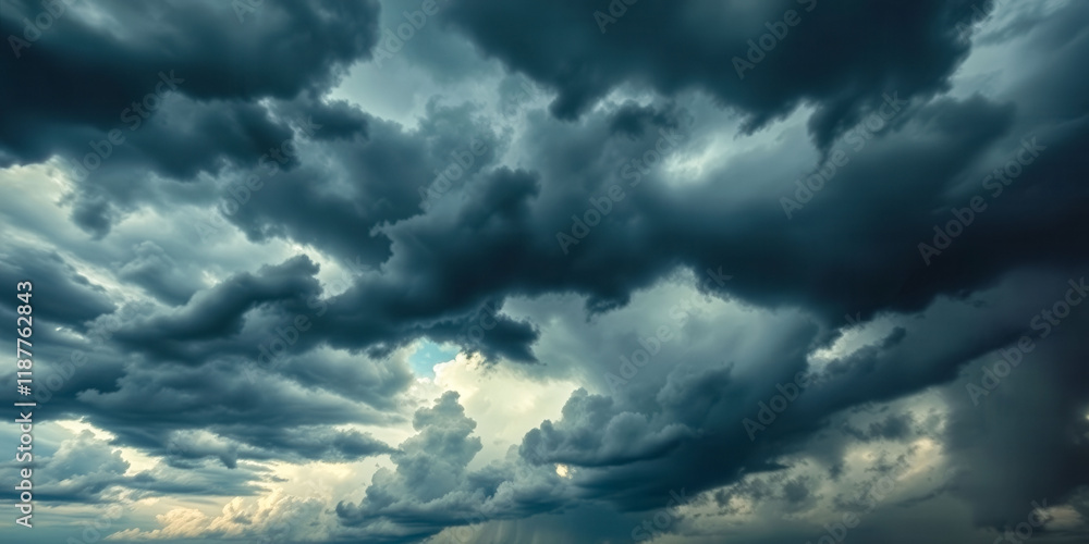 Poster the sky is filled with dark clouds and the sun is barely visible. scene is ominous and foreboding
