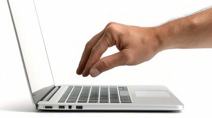 Hand Reaching Laptop Keyboard: A hand reaches towards the keyboard of a sleek silver laptop, poised to begin typing.  The image conveys a sense of anticipation, readiness, and the digital age.