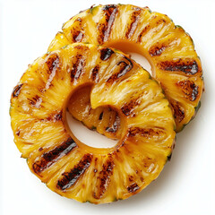 grilled pineapple spirals top down view isolated on solid white background