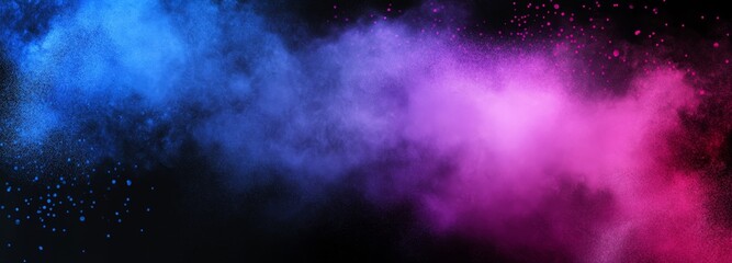 Obraz premium Vivid blue and pink powder explosions on black background