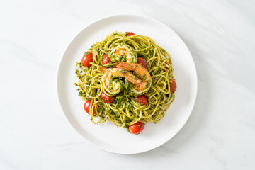 Spaghetti with prawns or shrimps in homemade pesto sauce