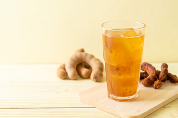 Delicious sweet drink tamarind juice and ice cube