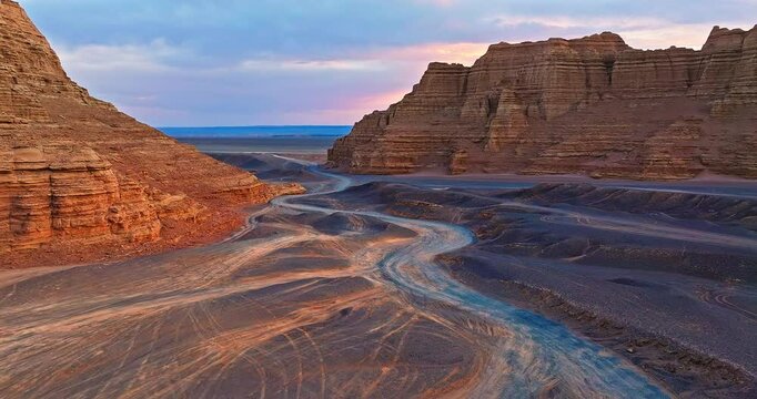 Aerial view of spectacular yadan landform mountain natural landscape at dusk. Famous dahaidao desert gobi in Xinjiang, China.
