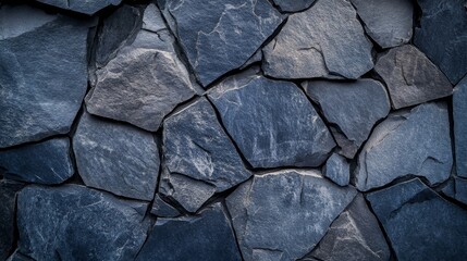 Fototapeta premium Dark blue stone wall texture with rough natural patterns