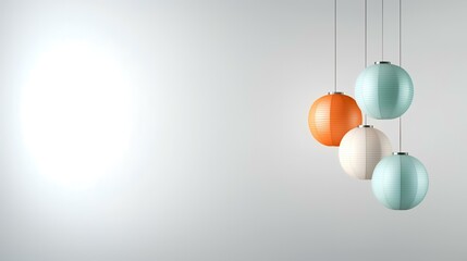 Colorful spherical pendant lights hang against a minimalist white wall, offering ample copy space for design or home decor projects
