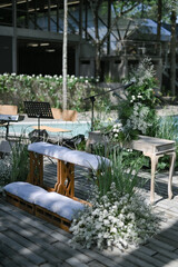 Wedding Decoration Fairy theme outdoors. Fairy theme wedding decoration outdoors. Intimate and private party. Wedding stage with a pool view