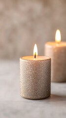 Two Glittering Candles Burning on Marble Surface, Calm Background, Relaxation