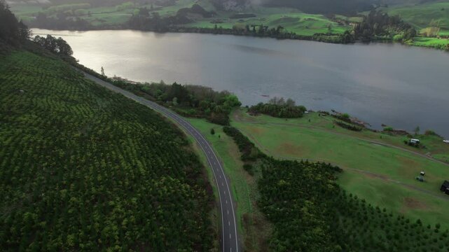 Drone shot of Pokuru Road winding around New Zealand's Waikato River.