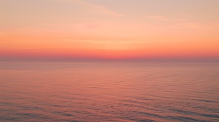 Obraz premium Serene Ocean Sunset Peaceful Pink Hues