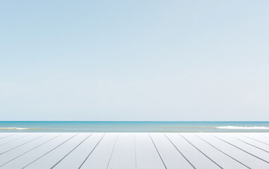 Calm beach view with clear skies and gentle waves during daytime