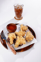 Fried chicken legs on a white background