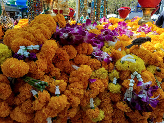 a pile of yellow and purple garland