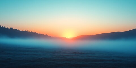 Fototapeta premium Sunrise over a calm lake with misty reflections