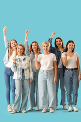 Fototapeta premium Portrait of happy women on blue background