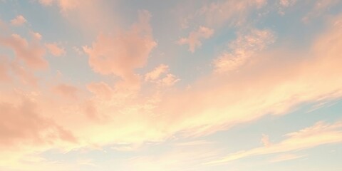 Fototapeta premium A serene sky with wispy clouds painted in soft hues of peach and azure, a tranquil landscape of light and air.