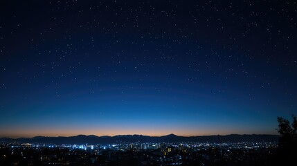 Night Sky Over City Lights with Stars and Horizon in Background