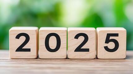 A wooden block with the numbers 20, 25, and 25 stacked on top of each other