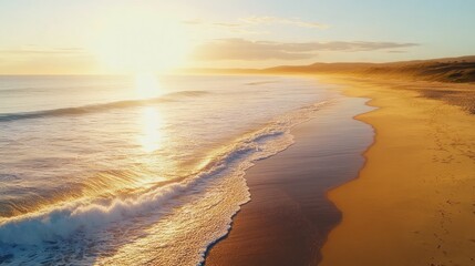 Aerial view of sunset over ocean beach.