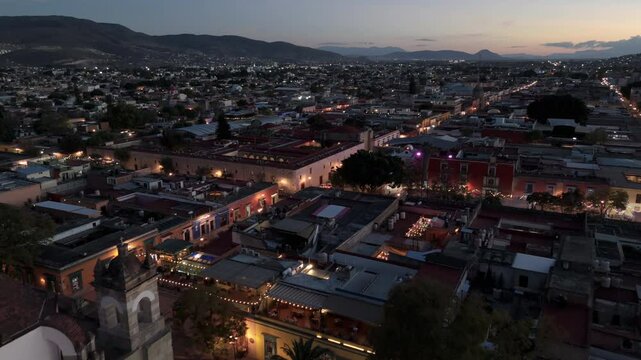 sunset view of Oaxaca flying back past Templo de Santo Domingo