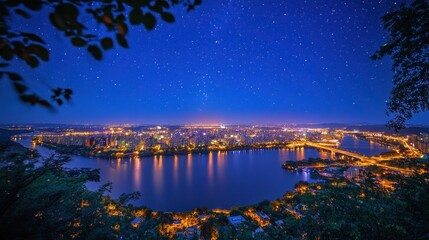 Starry Nightscape over City Lights and River