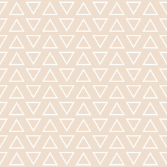 Almond and white colors seamless geometric pattern with triangles outline