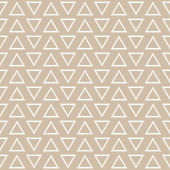 Dark vanilla and white colors seamless geometric pattern with triangles outline