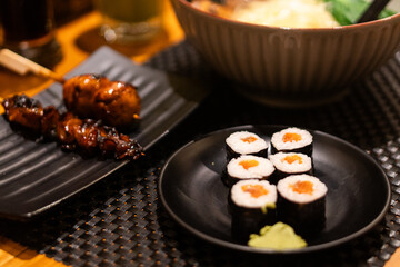 Salmon Sushi with Chopsticks in Japanese Dining Setting