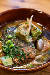 Corvina in green sauce with artichokes and 