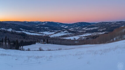 Serene Winter Sunset Over Snowy Mountain Valley