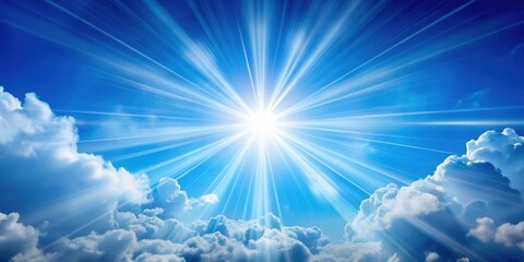 Solar rays shining through clear blue sky with few white clouds and sunbeam breaking through the gap