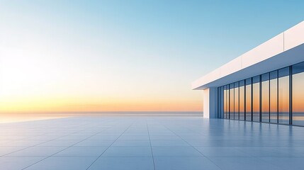 Fototapeta premium A white minimalist building with large floor-to-ceiling windows overlooking the sea.
