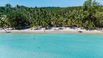Relaxing under the sun at the beautiful shores of Koh Kood in Thailand