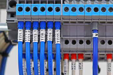 Marking of electrical wires using thermal printing on vinyl tape.