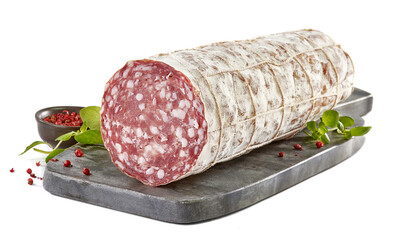 Francuska kiełbasa Rosette de Lyon na czarnej desce z ziołami © Blue Pixel