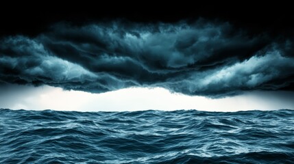 Fototapeta premium A dramatic seascape featuring dark, turbulent clouds above a restless ocean, evoking a sense of impending storm and nature's raw power.