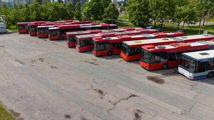 Aerial View of Parked Buses in a Lot © M