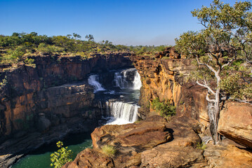 Upper cascades of Mitchell Falls, flowing down over sandstone rocks in the Kimberleys, Western Australia