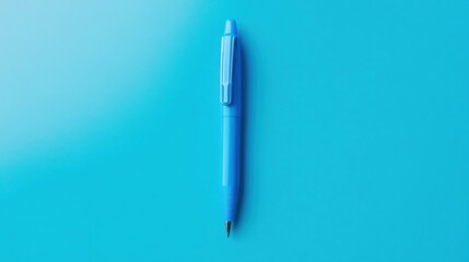 Vibrant blue click pen resting on a simple background, showcasing its sleek design and functionality.