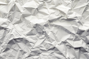 Obraz premium Crumpled white paper texture with soft lighting