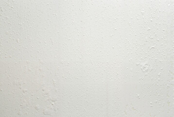 Minimalistic white wall texture with subtle light effects