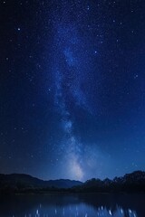 Fototapeta premium A starry night sky with the Milky Way, a mobile wallpaper with a dark blue background and white stars.