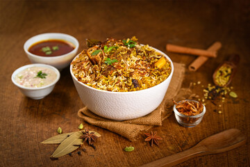 Mutton biryani with gravy with spices