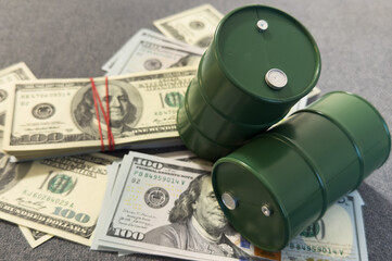 Spilled oil from a barrel to a dollar bill of money. Oil business. Profit from the sale of petroleum products, imports.