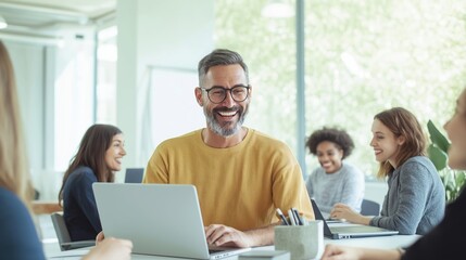 Obraz premium Business team collaborates in modern office. Project manager explains idea to colleagues. Happy people discuss marketing strategy on laptops. Indoor workplace. Teamwork creates successful projects.